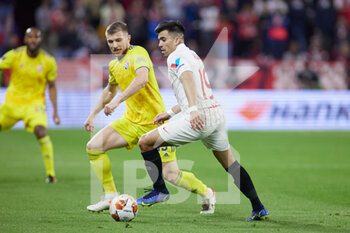 2022-02-17 - Mario Cuze of Dinamo Zagreb and Marcos Acuna of Sevilla FC during the UEFA Europa League, Play-off, 1st leg football match between Sevilla FC and Dinamo Zagreb on February 17, 2022 at Ramon Sanchez-Pizjuan stadium in Sevilla, Spain - SEVILLA FC VS DINAMO ZAGREB - UEFA EUROPA LEAGUE - SOCCER
