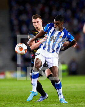 2022-02-24 - Alexander Isak of Real Sociedad competes for the ball with Willi Orban of RB Leipzig during the UEFA Europa League, Play-off, 2nd leg football match between Real Sociedad and RB Leipzig on February 24, 2022 at Anoeta stadium in San Sebastian, Spain - REAL SOCIEDAD VS RB LEIPZIG - UEFA EUROPA LEAGUE - SOCCER