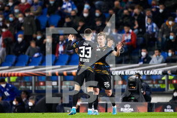 2022-02-24 - Andre Silva and Dani Olmo of RB Leipzig celebrate after scoring a goal during the UEFA Europa League, Play-off, 2nd leg football match between Real Sociedad and RB Leipzig on February 24, 2022 at Anoeta stadium in San Sebastian, Spain - REAL SOCIEDAD VS RB LEIPZIG - UEFA EUROPA LEAGUE - SOCCER