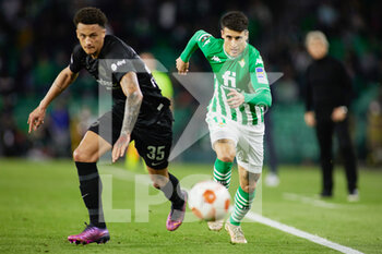 2022-03-09 - Lucas Silva "Tuta" of Eintracht and Cristian Tello of Real Betis during the UEFA Europa League, Round of 16, 1st leg football match between Real Betis and Eintracht Frankfurt on March 9, 2022 at Benito Villamarin stadium in Sevilla, Spain - REAL BETIS VS EINTRACHT FRANKFURT - UEFA EUROPA LEAGUE - SOCCER