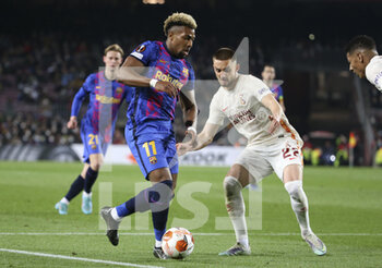 2022-03-10 - Adama Traore of Barcelona, Berkan Kutlu of Galatasaray during the UEFA Europa League, Round of 16, 1st leg football match between FC Barcelona and Galatasaray on March 10, 2022 at Camp Nou stadium in Barcelona, Spain - FC BARCELONA VS GALATASARAY - UEFA EUROPA LEAGUE - SOCCER