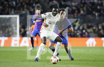 2022-03-10 - Bafetimbi Gomis of Galatasaray, Eric Garcia of Barcelona during the UEFA Europa League, Round of 16, 1st leg football match between FC Barcelona and Galatasaray on March 10, 2022 at Camp Nou stadium in Barcelona, Spain - FC BARCELONA VS GALATASARAY - UEFA EUROPA LEAGUE - SOCCER