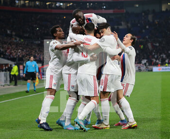 2022-03-17 - Moussa Dembele of Olympique Lyonnais celebrating a goal  with team mates during the UEFA Europa League, Round of 16, 2nd leg football match between Olympique Lyonnais (Lyon) and FC Porto on March 17, 2022 at Groupama stadium in Decines-Charpieu near Lyon, France - OLYMPIQUE LYONNAIS VS FC PORTO - UEFA EUROPA LEAGUE - SOCCER