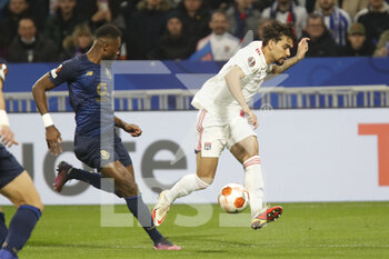 2022-03-17 - Lucas PAQUETA of Lyon and Chancel MBEMBA of Porto during the UEFA Europa League, Round of 16, 2nd leg football match between Olympique Lyonnais (Lyon) and FC Porto on March 17, 2022 at Groupama stadium in Decines-Charpieu near Lyon, France - OLYMPIQUE LYONNAIS (LYON, OL) VS FC PORTO - UEFA EUROPA LEAGUE - SOCCER