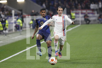 2022-03-17 - Maxence CAQUERET of Lyon and GALENO of Porto during the UEFA Europa League, Round of 16, 2nd leg football match between Olympique Lyonnais (Lyon) and FC Porto on March 17, 2022 at Groupama stadium in Decines-Charpieu near Lyon, France - OLYMPIQUE LYONNAIS (LYON, OL) VS FC PORTO - UEFA EUROPA LEAGUE - SOCCER