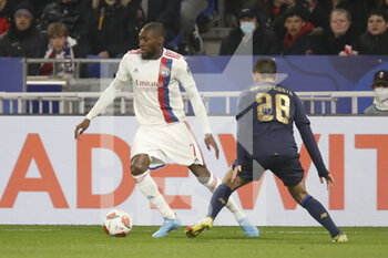 2022-03-17 - Karl TOKO EKAMBI of Lyon and Bruno COSTA of Porto during the UEFA Europa League, Round of 16, 2nd leg football match between Olympique Lyonnais (Lyon) and FC Porto on March 17, 2022 at Groupama stadium in Decines-Charpieu near Lyon, France - OLYMPIQUE LYONNAIS (LYON, OL) VS FC PORTO - UEFA EUROPA LEAGUE - SOCCER
