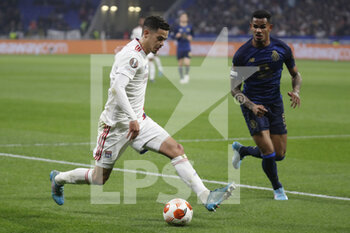 2022-03-17 - Romain FAIVRE of Lyon and GALENO of Porto during the UEFA Europa League, Round of 16, 2nd leg football match between Olympique Lyonnais (Lyon) and FC Porto on March 17, 2022 at Groupama stadium in Decines-Charpieu near Lyon, France - OLYMPIQUE LYONNAIS (LYON, OL) VS FC PORTO - UEFA EUROPA LEAGUE - SOCCER