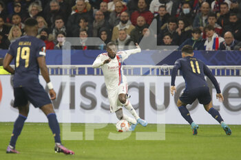 2022-03-17 - Karl TOKO EKAMBI of Lyon and PEPE of Porto during the UEFA Europa League, Round of 16, 2nd leg football match between Olympique Lyonnais (Lyon) and FC Porto on March 17, 2022 at Groupama stadium in Decines-Charpieu near Lyon, France - OLYMPIQUE LYONNAIS (LYON, OL) VS FC PORTO - UEFA EUROPA LEAGUE - SOCCER