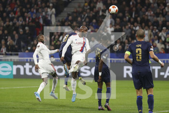 2022-03-17 - Moussa DEMBELE of Lyon and Bruno COSTA of Porto and Karl TOKO EKAMBI of Lyon during the UEFA Europa League, Round of 16, 2nd leg football match between Olympique Lyonnais (Lyon) and FC Porto on March 17, 2022 at Groupama stadium in Decines-Charpieu near Lyon, France - OLYMPIQUE LYONNAIS (LYON, OL) VS FC PORTO - UEFA EUROPA LEAGUE - SOCCER
