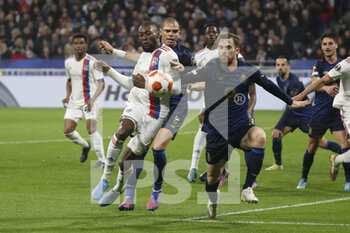 2022-03-17 - Karl TOKO EKAMBI of Lyon and PEPE of Porto and during the UEFA Europa League, Round of 16, 2nd leg football match between Olympique Lyonnais (Lyon) and FC Porto on March 17, 2022 at Groupama stadium in Decines-Charpieu near Lyon, France - OLYMPIQUE LYONNAIS (LYON, OL) VS FC PORTO - UEFA EUROPA LEAGUE - SOCCER