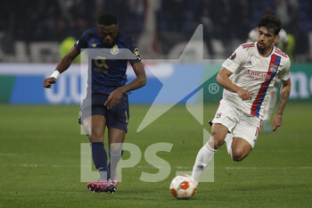 2022-03-17 - Chancel MBEMBA of Porto and Lucas PAQUETA of Lyon during the UEFA Europa League, Round of 16, 2nd leg football match between Olympique Lyonnais (Lyon) and FC Porto on March 17, 2022 at Groupama stadium in Decines-Charpieu near Lyon, France - OLYMPIQUE LYONNAIS (LYON, OL) VS FC PORTO - UEFA EUROPA LEAGUE - SOCCER