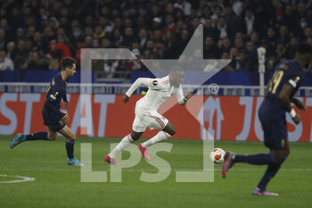 2022-03-17 - Tanguy NDOMBELE of Lyon and Fabio VIEIRA of Porto during the UEFA Europa League, Round of 16, 2nd leg football match between Olympique Lyonnais (Lyon) and FC Porto on March 17, 2022 at Groupama stadium in Decines-Charpieu near Lyon, France - OLYMPIQUE LYONNAIS (LYON, OL) VS FC PORTO - UEFA EUROPA LEAGUE - SOCCER