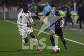 2022-03-17 - Fabio VIEIRA of Porto and Tanguy NDOMBELE of Lyon during the UEFA Europa League, Round of 16, 2nd leg football match between Olympique Lyonnais (Lyon) and FC Porto on March 17, 2022 at Groupama stadium in Decines-Charpieu near Lyon, France - OLYMPIQUE LYONNAIS (LYON, OL) VS FC PORTO - UEFA EUROPA LEAGUE - SOCCER