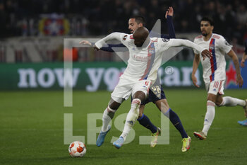 2022-03-17 - Moussa DEMBELE of Lyon and Bruno COSTA of Porto during the UEFA Europa League, Round of 16, 2nd leg football match between Olympique Lyonnais (Lyon) and FC Porto on March 17, 2022 at Groupama stadium in Decines-Charpieu near Lyon, France - OLYMPIQUE LYONNAIS (LYON, OL) VS FC PORTO - UEFA EUROPA LEAGUE - SOCCER