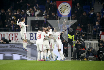 2022-03-17 - Moussa Dembele of Lyon celebrates his goal with teammates during the UEFA Europa League, Round of 16, 2nd leg football match between Olympique Lyonnais (Lyon, OL) and FC Porto on March 17, 2022 at Groupama stadium in Decines-Charpieu near Lyon, France - OLYMPIQUE LYONNAIS (LYON, OL) VS FC PORTO - UEFA EUROPA LEAGUE - SOCCER