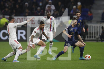 2022-03-17 - Fabio VIEIRA of Porto and EMERSON of Lyon and Houssem AOUAR of Lyon during the UEFA Europa League, Round of 16, 2nd leg football match between Olympique Lyonnais (Lyon) and FC Porto on March 17, 2022 at Groupama stadium in Decines-Charpieu near Lyon, France - OLYMPIQUE LYONNAIS (LYON, OL) VS FC PORTO - UEFA EUROPA LEAGUE - SOCCER