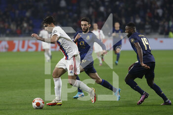 2022-03-17 - Lucas PAQUETA of Lyon and Joao MARIO of Porto and Chancel MBEMBA of Porto during the UEFA Europa League, Round of 16, 2nd leg football match between Olympique Lyonnais (Lyon) and FC Porto on March 17, 2022 at Groupama stadium in Decines-Charpieu near Lyon, France - OLYMPIQUE LYONNAIS (LYON, OL) VS FC PORTO - UEFA EUROPA LEAGUE - SOCCER