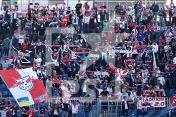 2022-04-14 - RB Leipzig supporters hold up their scarves - ATALANTA BC VS RB LIPSIA - UEFA EUROPA LEAGUE - SOCCER