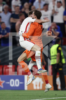 2022-05-18 - Kristijan Jakic (Eintracht Frankfurt) and Kevin Trapp (Eintracht Frankfurt) celebrate after winning the penalty shootout  - UEFA EUROPA LEAGUE 2022 FINAL - EINTRACHT VS RANGERS - UEFA EUROPA LEAGUE - SOCCER