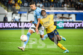 2022-09-15 - Dennis HADZIKADUNIC of Malmo and Lazare AMANI of Royale Union Saint Gilloise during the UEFA Europa League, Group D football match between Royale Union Saint Gilloise and Malmo FF on September 15, 2022 at The King Power At Den Dreef Stadium in Louvain, Belgium - FOOTBALL - EUROPA LEAGUE - SAINT GILLOISE V MALMO - UEFA EUROPA LEAGUE - SOCCER