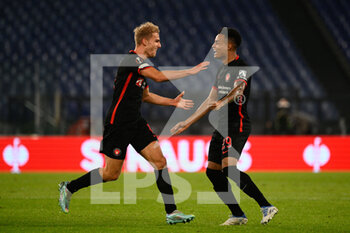 2022-10-27 - Gustav Isaksen (FC Midtjylland) and Paulinho (FC Midtjylland) celebrates after scoring the goal 0-1 during the UEFA Europa League 2022-2023 football match between SS Lazio and FC Midtjylland at The Olympic Stadium in Rome on 27 October 2022. - SS LAZIO VS FC MIDTJYLLAND - UEFA EUROPA LEAGUE - SOCCER