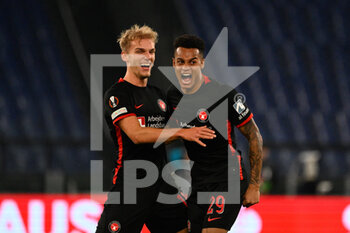 2022-10-27 - Gustav Isaksen (FC Midtjylland) and Paulinho (FC Midtjylland) celebrates after scoring the goal 0-1 during the UEFA Europa League 2022-2023 football match between SS Lazio and FC Midtjylland at The Olympic Stadium in Rome on 27 October 2022. - SS LAZIO VS FC MIDTJYLLAND - UEFA EUROPA LEAGUE - SOCCER