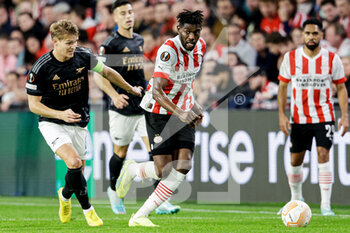 2022-10-27 - Martin Odegaard of Arsenal FC, Ibrahim Sangare of PSV Eindhoven during the UEFA Europa League, Group A football match between PSV Eindhoven and Arsenal FC on October 27, 2022 at Philips Stadion in Eindhoven, Netherlands - FOOTBALL - EUROPA LEAGUE - PSV V ARSENAL - UEFA EUROPA LEAGUE - SOCCER