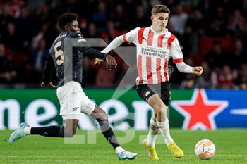 2022-10-27 - Thomas Partey of Arsenal FC, Guus Til of PSV Eindhoven during the UEFA Europa League, Group A football match between PSV Eindhoven and Arsenal FC on October 27, 2022 at Philips Stadion in Eindhoven, Netherlands - FOOTBALL - EUROPA LEAGUE - PSV V ARSENAL - UEFA EUROPA LEAGUE - SOCCER