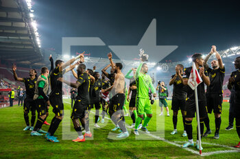 2022-11-03 - Players of FC Nantes celebrating the victory during the UEFA Europa League group G match between Olympiacos FC v FC Nantes at the Karaiskakis Stadium on November 3, 2022 in Athens, Greece. - OLYMPIACOS VS NANTES - UEFA EUROPA LEAGUE - SOCCER