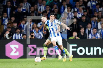 2022-11-03 - Carlos Fernandez of Real Sociedad competes for the ball with Diogo Dalot of Manchester United during the UEFA Europa League, Group E football match between Real Sociedad and Manchester United on November 3, 2022 at Reale Arena in San Sebastian, Spain - FOOTBALL - EUROPA LEAGUE - REAL SOCIEDAD V MANCHESTER UNITED - UEFA EUROPA LEAGUE - SOCCER