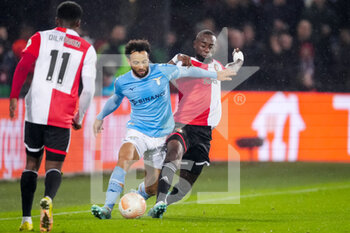 2022-11-03 - Felipe Anderson of SS Lazio is challenged by Lutsharel Geertruida of Feyenoord during the UEFA Europa League, Group F football match between Feyenoord and SS Lazio on November 3, 2022 at Stadion Feijenoord in Rotterdam, Netherlands - FOOTBALL - EUROPA LEAGUE - FEYENOORD V LAZIO - UEFA EUROPA LEAGUE - SOCCER