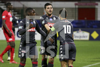 2022-01-02 - Wissam Ben Yedder of Monaco #10 celebrates his goal with left Eliot Matazo, Kevin Volland during the French Cup, round of 32, football match between Quevilly Rouen Metropole (QRM) and AS Monaco (ASM) on January 2, 2022 at Stade Robert Diochon in Le Petit-Quevilly near Rouen, France - QUEVILLY ROUEN METROPOLE (QRM) VS AS MONACO (ASM) - FRENCH CUP - SOCCER