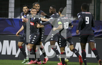 2022-01-02 - Kevin Volland of Monaco, far left, celebrates his goal with teammates during the French Cup, round of 32, football match between Quevilly Rouen Metropole (QRM) and AS Monaco (ASM) on January 2, 2022 at Stade Robert Diochon in Le Petit-Quevilly near Rouen, France - QUEVILLY ROUEN METROPOLE (QRM) VS AS MONACO (ASM) - FRENCH CUP - SOCCER