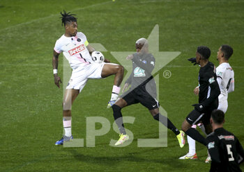 2022-01-03 - Presnel Kimpembe of PSG, Jiannin Berenice of Vannes during the French Cup, round of 32, football match between Vannes OC (Vannes Olympique Club) and Paris Saint-Germain (PSG) on January 3, 2022 at Stade de La Rabine in Vannes, France - VANNES OC (VANNES OLYMPIQUE CLUB) VS PARIS SAINT-GERMAIN (PSG) - FRENCH CUP - SOCCER