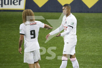 2022-01-03 - Kylian Mbappe of PSG celebrates his goal with Xavi Simons (left) during the French Cup, round of 32, football match between Vannes OC (Vannes Olympique Club) and Paris Saint-Germain (PSG) on January 3, 2022 at Stade de La Rabine in Vannes, France - VANNES OC (VANNES OLYMPIQUE CLUB) VS PARIS SAINT-GERMAIN (PSG) - FRENCH CUP - SOCCER