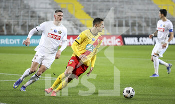 2022-01-04 - Florian Sotoca of Lens, Sven Botman of Lille (left) during the French Cup, round of 32, football match between RC Lens (RCL) and Lille OSC (LOSC) on January 4, 2022 at Stade Bollaert-Delelis in Lens, France - RC LENS (RCL) VS LILLE OSC (LOSC) - FRENCH CUP - SOCCER