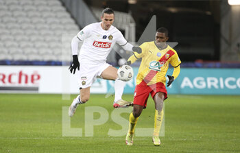 2022-01-04 - Yusuf Yazici of Lille, David Pereira Da Costa of Lens during the French Cup, round of 32, football match between RC Lens (RCL) and Lille OSC (LOSC) on January 4, 2022 at Stade Bollaert-Delelis in Lens, France - RC LENS (RCL) VS LILLE OSC (LOSC) - FRENCH CUP - SOCCER