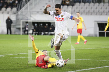 2022-01-04 - Jose Fonte of Lille, Florian Sotoca of Lens (left) during the French Cup, round of 32, football match between RC Lens (RCL) and Lille OSC (LOSC) on January 4, 2022 at Stade Bollaert-Delelis in Lens, France - RC LENS (RCL) VS LILLE OSC (LOSC) - FRENCH CUP - SOCCER