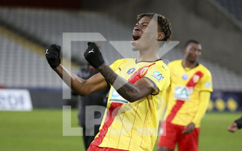 2022-01-04 - Christopher Wooh of Lens celebrates the victory after the penalty shoot-out during the French Cup, round of 32, football match between RC Lens (RCL) and Lille OSC (LOSC) on January 4, 2022 at Stade Bollaert-Delelis in Lens, France - RC LENS (RCL) VS LILLE OSC (LOSC) - FRENCH CUP - SOCCER