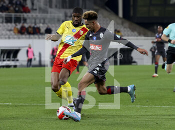 2022-01-30 - Sofiane Diop of Monaco, Kevin Danso of Lens (left) during the French Cup, round of 16 football match between RC Lens and AS Monaco on January 30, 2022 at Stade Bollaert-Delelis in Lens, France - RC LENS VS AS MONACO - FRENCH CUP - SOCCER