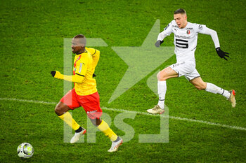 08/01/2022 - Gael KAKUTA of Lens and Adrien TRUFFERT of Rennes during the French championship Ligue 1 football match between RC Lens and Stade Rennais (Rennes) on January 8, 2022 at Bollaert-Delelis stadium in Lens, France - RC LENS VS STADE RENNAIS (RENNES) - FRENCH LIGUE 1 - CALCIO