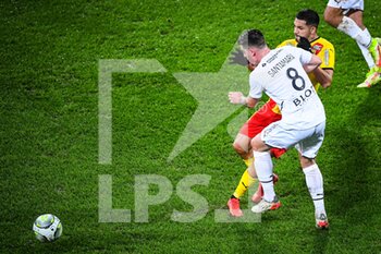 08/01/2022 - Baptiste SANTAMARIA of Rennes and Facundo Axel MEDINA of Lens during the French championship Ligue 1 football match between RC Lens and Stade Rennais (Rennes) on January 8, 2022 at Bollaert-Delelis stadium in Lens, France - RC LENS VS STADE RENNAIS (RENNES) - FRENCH LIGUE 1 - CALCIO