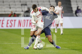 09/01/2022 - Bruno Guimaraes of Lyon and Leandro Paredes of Paris during the French championship Ligue 1 football match between Olympique Lyonnais (Lyon) and Paris Saint-Germain on January 9, 2022 at Groupama stadium in Decines-Charpieu near Lyon, France - OLYMPIQUE LYONNAIS (LYON) VS PARIS SAINT-GERMAIN - FRENCH LIGUE 1 - CALCIO