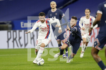 09/01/2022 - Houssem Aouar of Lyon and Ander Herrera of Paris during the French championship Ligue 1 football match between Olympique Lyonnais (Lyon) and Paris Saint-Germain on January 9, 2022 at Groupama stadium in Decines-Charpieu near Lyon, France - OLYMPIQUE LYONNAIS (LYON) VS PARIS SAINT-GERMAIN - FRENCH LIGUE 1 - CALCIO