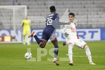 09/01/2022 - Lucas Paqueta of Lyon and Nuno Mendes of Paris during the French championship Ligue 1 football match between Olympique Lyonnais (Lyon) and Paris Saint-Germain on January 9, 2022 at Groupama stadium in Decines-Charpieu near Lyon, France - OLYMPIQUE LYONNAIS (LYON) VS PARIS SAINT-GERMAIN - FRENCH LIGUE 1 - CALCIO