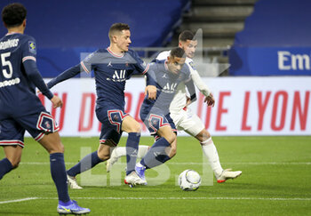 09/01/2022 - Colin Dagba of PSG between Ander Herrera of PSG and Houssem Aouar of Lyon during the French championship Ligue 1 football match between Olympique Lyonnais (Lyon) and Paris Saint-Germain on January 9, 2022 at Groupama stadium in Decines-Charpieu near Lyon, France - OLYMPIQUE LYONNAIS (LYON) VS PARIS SAINT-GERMAIN - FRENCH LIGUE 1 - CALCIO