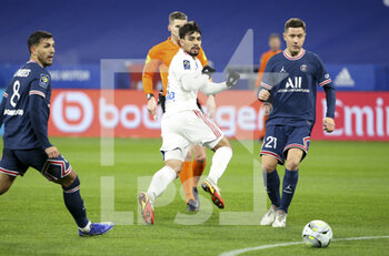09/01/2022 - Lucas Paqueta of Lyon between Leandro Paredes and Ander Herrera of PSG during the French championship Ligue 1 football match between Olympique Lyonnais (Lyon) and Paris Saint-Germain on January 9, 2022 at Groupama stadium in Decines-Charpieu near Lyon, France - OLYMPIQUE LYONNAIS (LYON) VS PARIS SAINT-GERMAIN - FRENCH LIGUE 1 - CALCIO