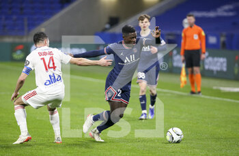 09/01/2022 - Nuno Mendes of PSG during the French championship Ligue 1 football match between Olympique Lyonnais (Lyon) and Paris Saint-Germain on January 9, 2022 at Groupama stadium in Decines-Charpieu near Lyon, France - OLYMPIQUE LYONNAIS (LYON) VS PARIS SAINT-GERMAIN - FRENCH LIGUE 1 - CALCIO