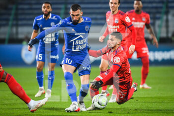 16/01/2022 - Florian TARDIEU of ESTAC Troyes and Houssem AOUAR of Lyon during the French championship Ligue 1 football match between ESTAC Troyes and Olympique Lyonnais (Lyon) on January 16, 2022 at Stade de L'Aube in Troyes, France - ESTAC TROYES VS OLYMPIQUE LYONNAIS (LYON) - FRENCH LIGUE 1 - CALCIO