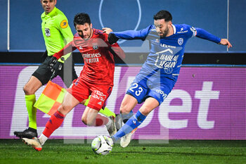 16/01/2022 - Leo DUBOIS of Lyon and Adil RAMI of ESTAC Troyes during the French championship Ligue 1 football match between ESTAC Troyes and Olympique Lyonnais (Lyon) on January 16, 2022 at Stade de L'Aube in Troyes, France - ESTAC TROYES VS OLYMPIQUE LYONNAIS (LYON) - FRENCH LIGUE 1 - CALCIO
